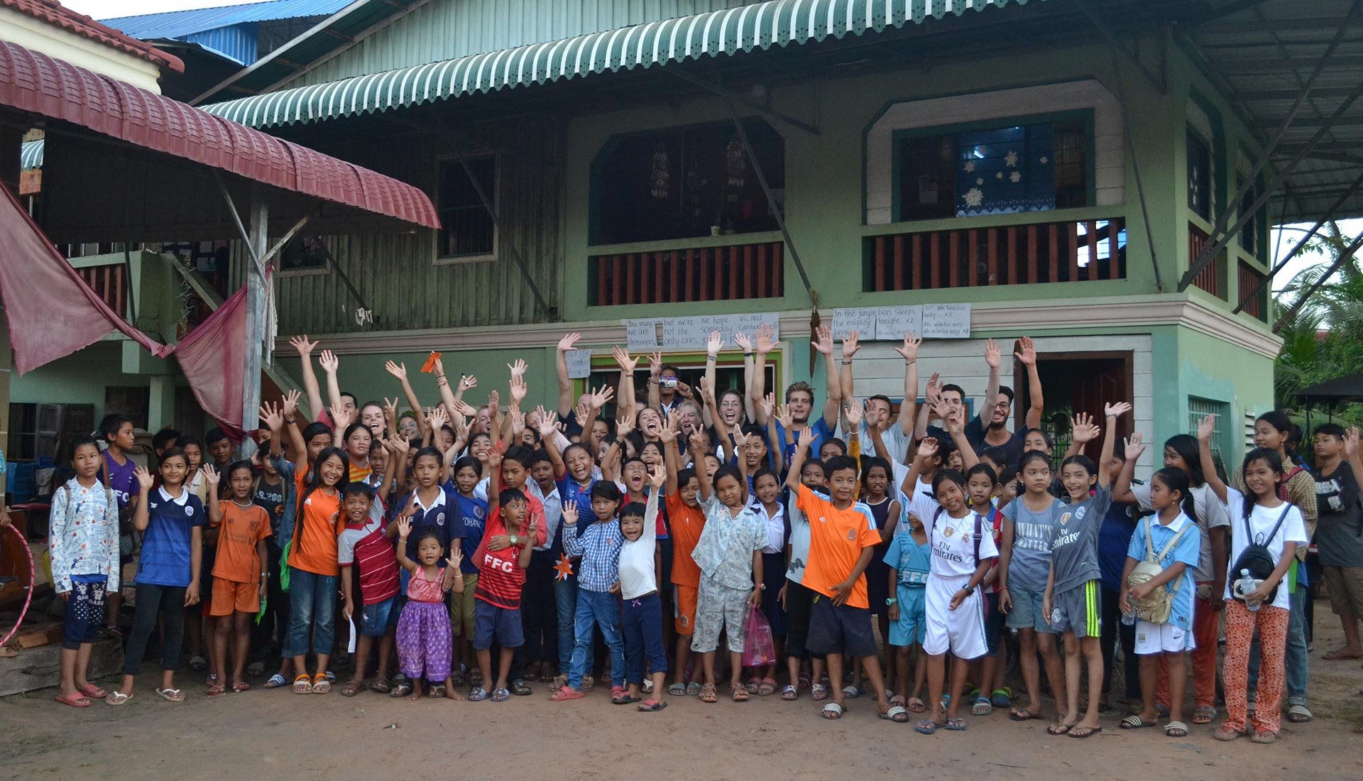 Students outside the ECC school building in Po Village